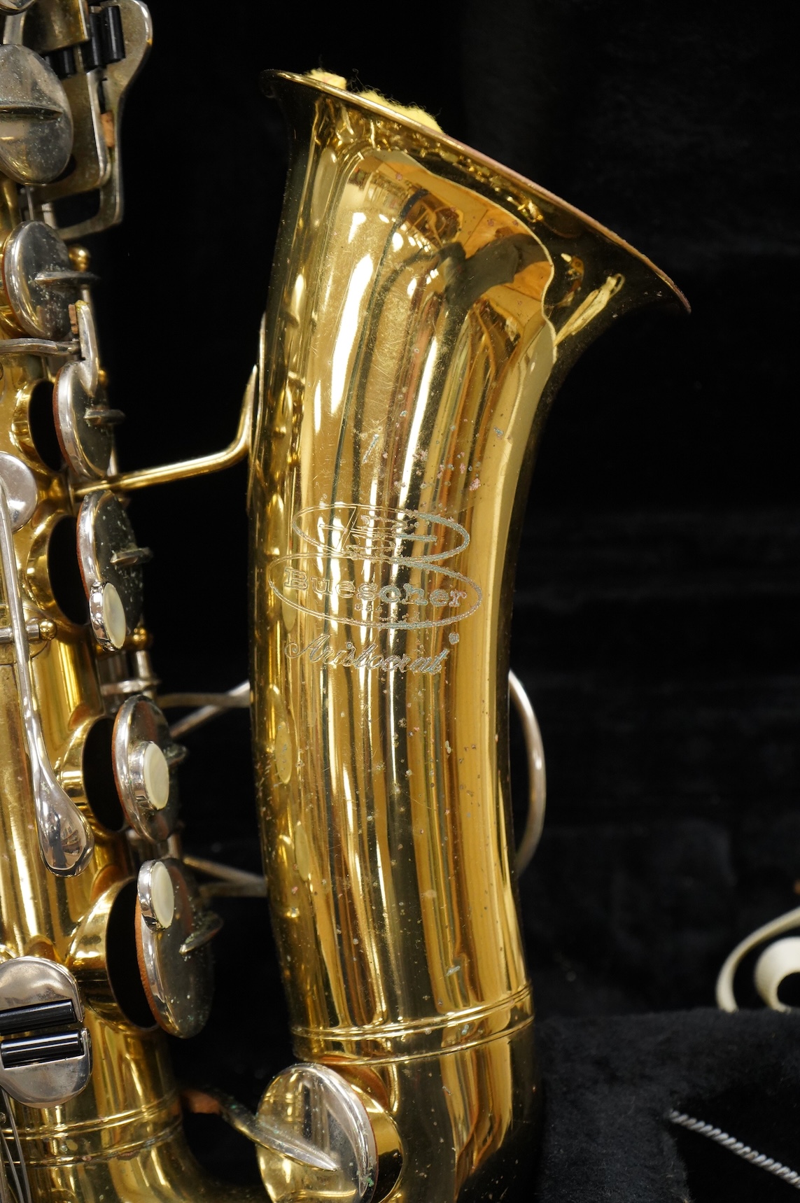 A cased Buesohner Aristocrat alto saxophone